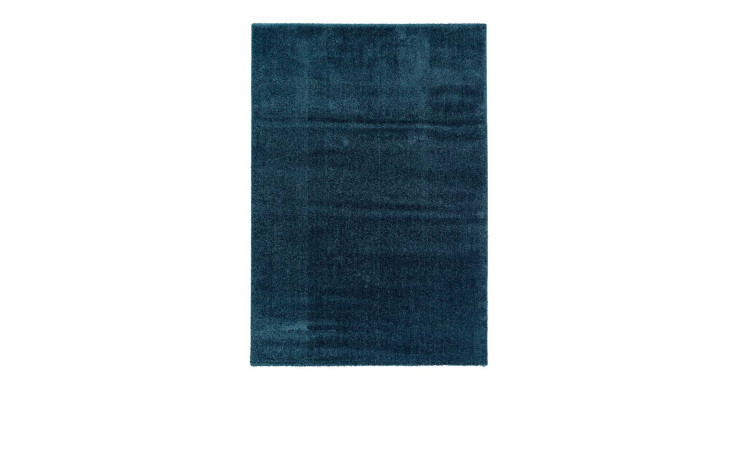 Der Astra Teppich Savona 80 x 150 cm, rechteckig, dunkelblau, mit flauschiger Oberfläche auf weißem Hintergrund.