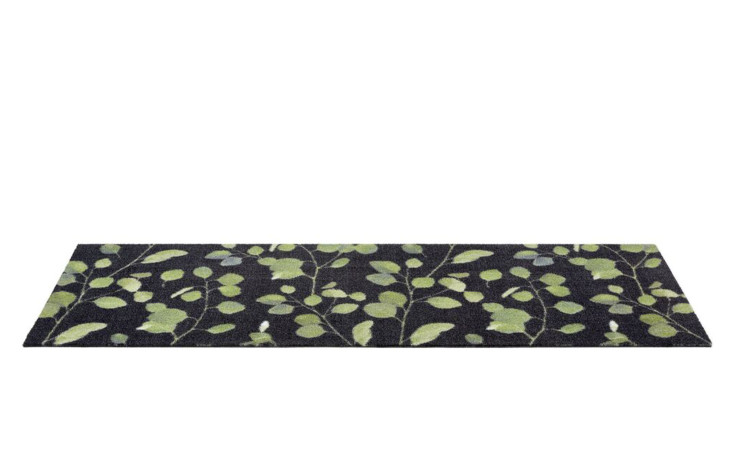 Astra Fußmatte Miabella 50 x 150 cm: schwarzer Polyamidteppich mit grünem Blätterzweigmuster.