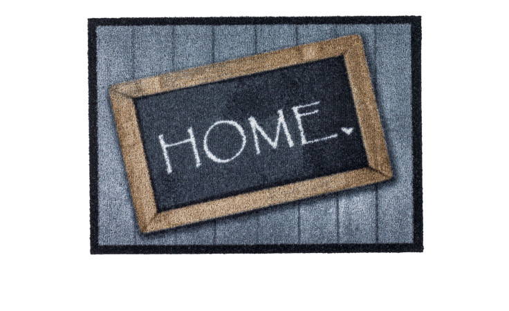 Die Astra Fußmatte Deco Brush 50 x 70 cm ist eine strapazierfähige Polyamid-Fußmatte mit HOME und einem weißen Herz-Kreidetafeldesign.
