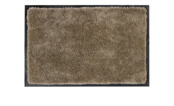 Die Astra Fußmatte Lava 40 x 60 cm ist eine beigefarbene Polyester-Fußmatte mit flauschiger Textur und schwarzem Rand.