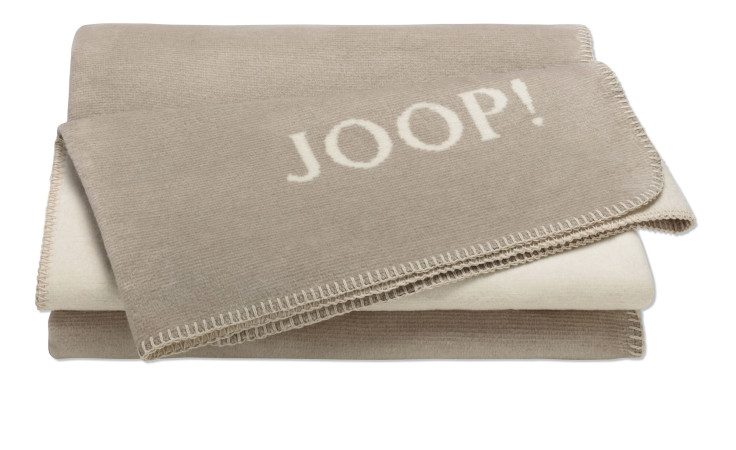JOOP! Wohndecke Melange Doubleface 150x200cm: beige Baumwolle-Decke mit weißen Joop-Schriftzug und Ziernaht.