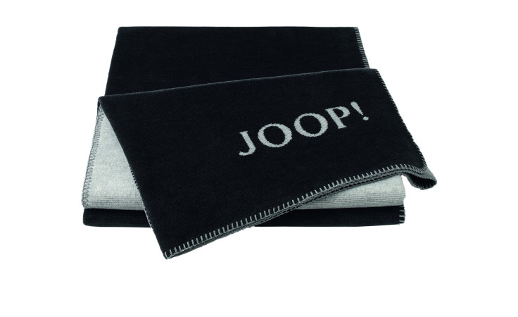 JOOP! Wohndecke Melange Doubleface von Joop, anthrazit, abgesteppte Kanten, sichtbares Logo auf weißem Grund.