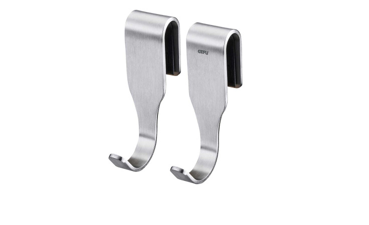 Das GEFU Haken-Set Smartline 2 tlg. zeichnet sich durch zwei schlichte silberne Über-Tür-Haken auf weißem Grund aus.