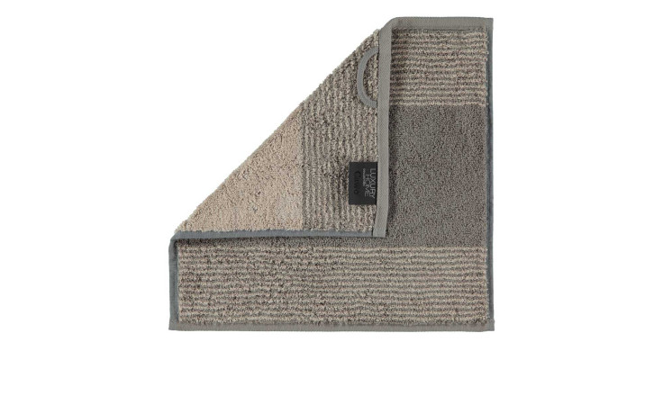 Cawö Seiftuch Two-Tone 30 x 30 cm Waschlappen in grau und beige, gefaltet mit beidseitig sichtbarem Stoffetikett.