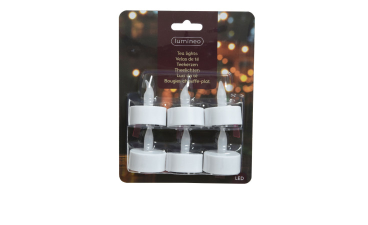 LED-Teelicht-Set 6 tlg., Weiß, Kunststoff, je 4 cm, auf Karte mit verschwommenem Lichter-Hintergrund verpackt.