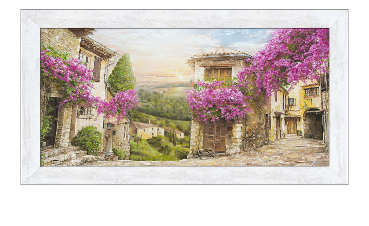 Eine Kopfsteinpflasterstraße mit Steinhäusern und lila Blumen - ideal als Rahmenbild Colourful Toscana von Pro-Art, 69 x 129 cm.