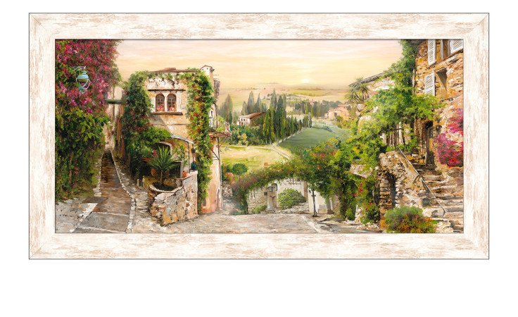 Pro-Art Rahmenbild Mediterranes Dorf 69 x 129 cm: Sonnenbeschienenes Steindorf mit üppigem Grün und Blick ins Tal.