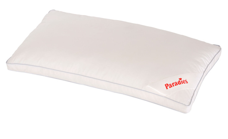 Rechteckiges Kissen Softy fest 40 x 80 cm von Paradies mit Kunstfaserfüllung und kleinem Label in der Ecke.