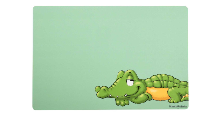 Ein Cartoon-Krokodil ziert den unteren rechten Rand der grünen Platzmatte Happy Zoo Koko von Ritzenhoff & Breker.