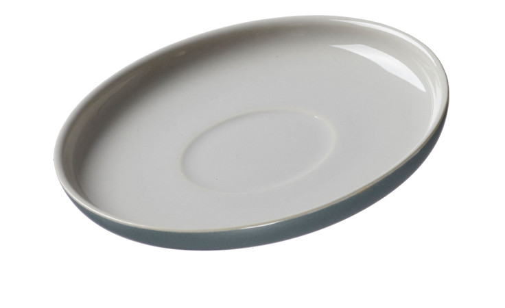 Die Espressountertasse Jasper 11 cm von Ritzenhoff & Breker hat eine weiße Oberfläche und einen leicht erhöhten Rand.