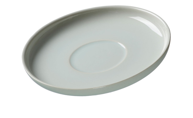 Die Ritzenhoff & Breker Espressountertasse Jasper 11 cm ist eine schlichte Untertasse aus weißem Steingut mit einer flachen Mitte.