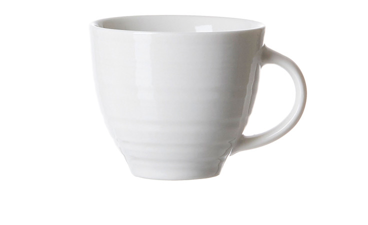 Die Espressotasse Suomi 80 ml von Ritzenhoff & Breker ist ein schlichter cremeweißer Porzellanbecher mit Henkel.