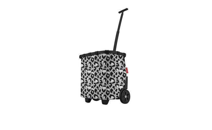 Der Reisenthel Einkaufstrolley Carrycruiser hat kugelgelagerte Räder und ein schwarz-weißes Leopardenmuster.