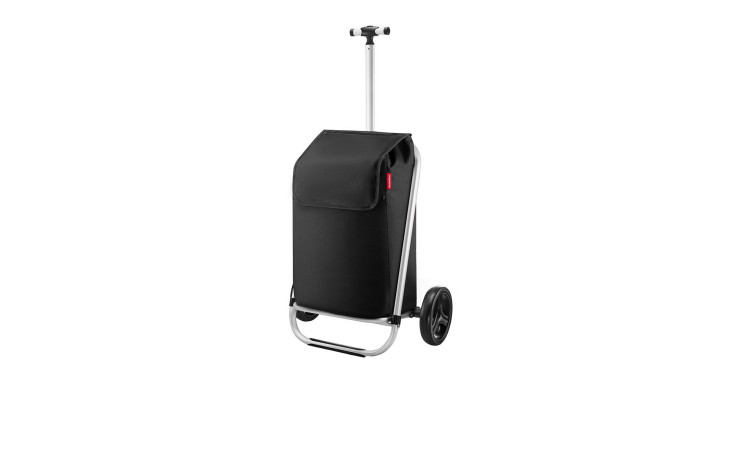 Der Reisenthel Einkaufstrolley Shopping Trolley, schwarzes Polyester mit silbernem Griff und zwei Rädern, steht aufrecht.