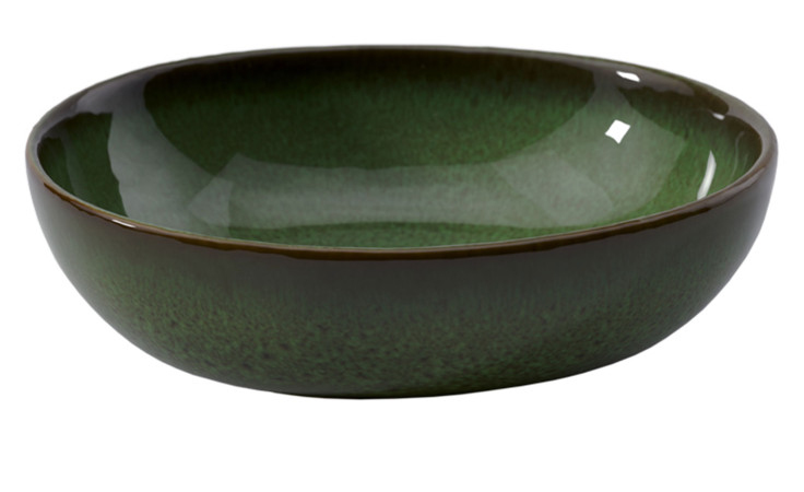 Die Müslischale Lave vert von Villeroy & Boch ist eine tiefe, runde Schale aus Steinzeug mit einer glänzend grünen Oberfläche.
