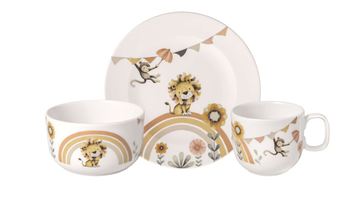 Das Kindergeschirr-Set Brüllen wie ein Löwe 3tlg. enthält einen beigen Teller, eine Schale und einen Becher mit Löwen-, Affen- und Regenbogenmotiven.