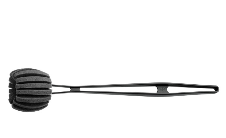 Die WMF Spülbürste Basic ist eine schwarze Kunststoff-Spülbürste mit geripptem Rundschwamm und ergonomischem Griff.
