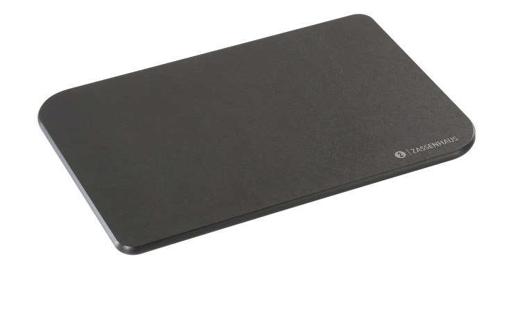 Das Schneidbrett Comfort Plus 26 x 17 cm ist ein rechteckiges Schwarzes Papierverbundstoffbrett mit abgerundeten Ecken, Zassenhaus-Logo unten rechts.