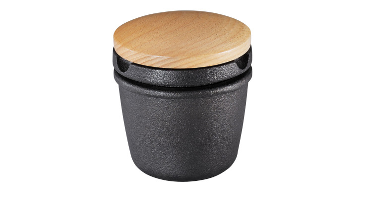 Die Gewürzreibe 8 x 9 cm ist ein schwarzes Gusseisengefäß mit einem runden Holzdeckel, ideal für schicke Metalldekorationen.