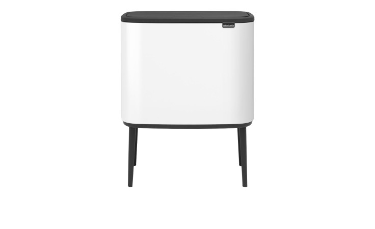 Der Abfalleimer Bo 11 & 23 l ist ein weißer Kunststoff-Eimer mit schwarzen Metallfüßen und Deckel auf weißem Grund.