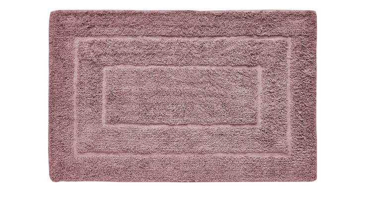 Die Andiamo Badematte Havanna (50x80 cm) ist eine mauvefarbene, plüschige, rechteckige Badematte mit einem erhabenen Bordürenmuster.
