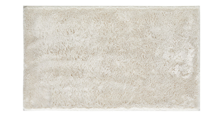 Die Andiamo Badematte Florida 60 x 100 cm ist eine flauschige, beigefarbene Rechteckmatte aus Synthetikfaser.