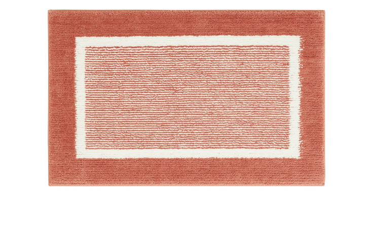 Die andiamo Badematte Maui, 50 x 80 cm, ist ein rostfarbener Teppich mit weißem Rand und horizontalen weißen Linien.
