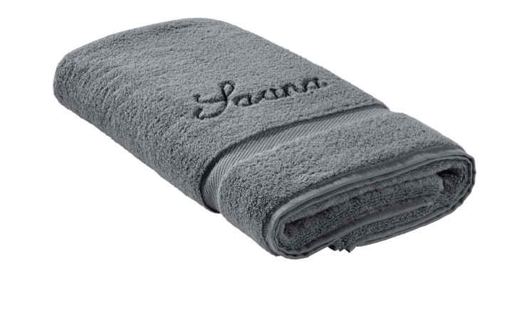 Ein gefaltetes Casa Nova Saunatuch 70 x 200 cm in Anthrazit, bestickt mit "Sauna" in dunklem Garn.
