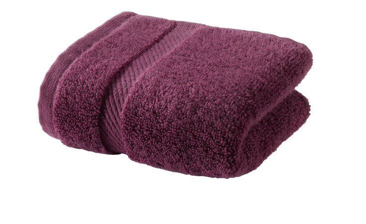 Ein gefaltetes Casa Nova Gästetuch 30 x 50 cm mit strukturierten Rändern auf weißem Hintergrund.