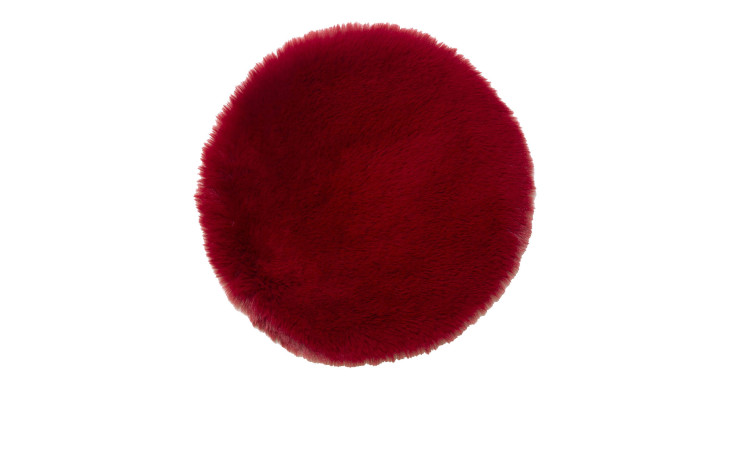 Ein rundes, flauschiges Sitzkissen 35 cm aus Synthetikfaser auf weißem Hintergrund.