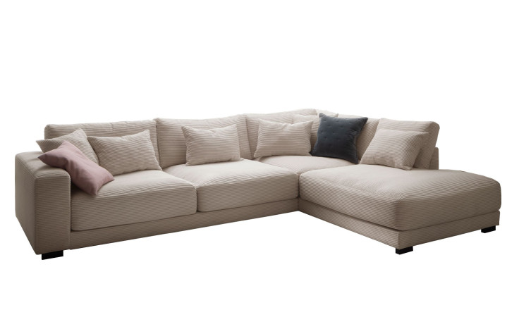 Wohnlandschaft Donatella in einem Beigen Cordstoff bezogen. 