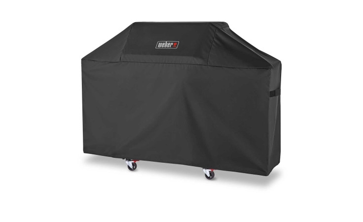 Die Weber Abdeckhaube Premium schützt BBQ-Grills mit Front-Weber-Logo dank witterungsbeständigem Gewebe.