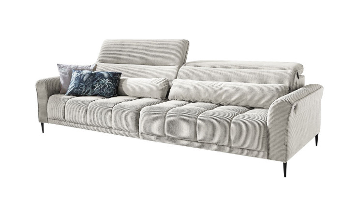 Komfort-Big Sofa Lilly mit einem Cordbezug in Creme.