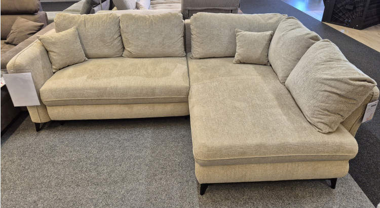 Wohnlandschaft „Hereford“ in Hellbeige, L-förmig mit Bettkasten, weichen Kissen, Stoff „Tresor 32“ in Kaschmir.
