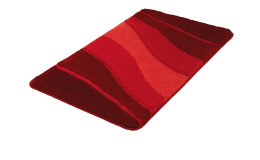 Kleine Wolke Badteppich Ocean, 70 x 120 cm, Synthetikfaser, gewellte rot-orangefarbene Streifen auf weißem Hintergrund.