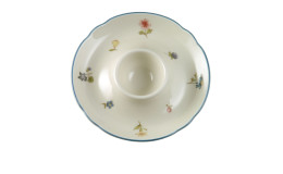 Eierbecher Marieluise aus Porzellan in beige mit floralem Motiv.