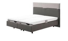 Polsterbett Discovery Classic in einem Bezug in Ash Grey in Stoff und Leder. Schräge Seitenansicht