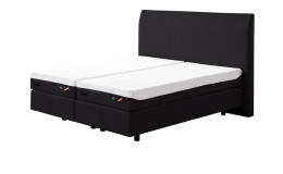 Boxspringbett Discovery Classic in einem Bezug in Charcoal in Stoff. Schräge Seitenansicht