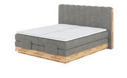 Boxspringbett MONDO NATUR Incana in einem Stoffbezug in Sand und einem Sichtholzrahmen in Eiche. 
