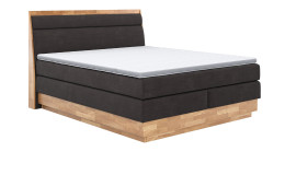 Boxspringbett MONDO NATUR Incana in einem Stoffbezug in Charcoal und einem Sichtholzrahmen in Eiche