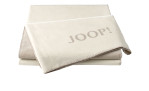 Gefaltete beige JOOP! Wohndecke Uni Doubleface 150x200 cm, weiche Baumwolle mit abgesteppten Kanten und auffälligem Joop-Branding.