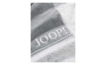 Nahaufnahme des JOOP! Duschtuch Classic (80x150 cm) von Joop mit eingewebtem Logo auf Naturfasergewebe.