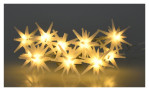 Die Sternenlichterkette 120 cm zeigt warmgelbe, sternförmige Lichterketten, die vor einem schlichten Hintergrund leuchten.
