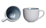 Zwei Ritzenhoff & Breker Kaffeetasse Skagen 220ml Becher, außen beige, innen blau; einer aufrecht, einer auf der Seite.