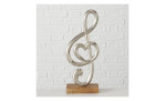Das Boltze Dekoobjekt Melodia 38 cm setzt mit seinem silbernen Violinschlüssel und dem Herz auf Holz einen stilvollen Akzent.