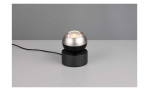 Die Trio LED-Tischleuchte Orbit 10 cm ist eine moderne schwarz-silberne Lampe mit Glasschirm, Leuchtmittel inklusive.