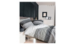 Feinbieber-Bettwäsche Davos, in der Größe 135 x 200 cm und in einer Mehrfarbigen Farbausführung mit Streifen und Schrift, auf einem Bett bezogen