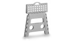 Klapphocker 37 x 30 x 32 cm aus grauem Kunststoff mit Löchern im Sitz und Korpus, auf weißem Hintergrund.