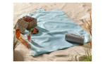 Picknickdecke 130 x 180  cm in türkis aus Polyester. Auf einem dekorierten Hintergrund