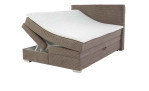 Boxspringbett Alice in der Farbe Taupe mit geöffnetem Bettkasten links
